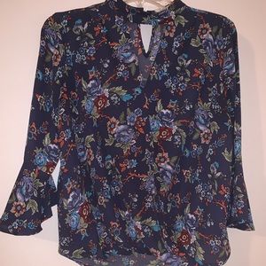 Women’s patterned blouse with flare sleeves